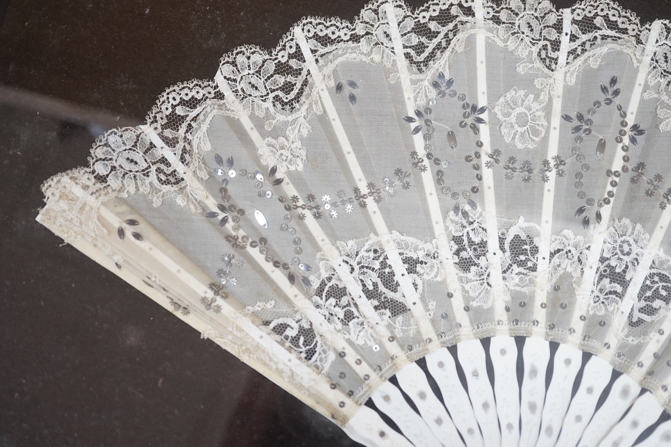 A pair of 19th century cased bone and painted lace fans, 40cm long excl frame